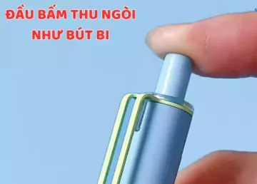 Cận cảnh ngón tay bấm đầu bút để thu ngòi như bút bi