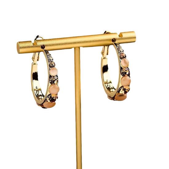 Our rhinestone and cat-eye hoop earrings