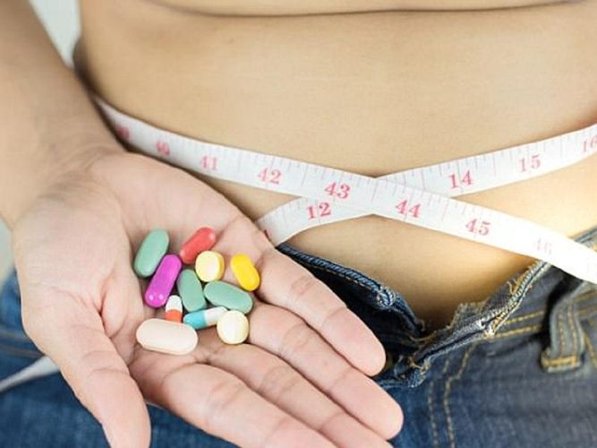 Measuring tape and pills