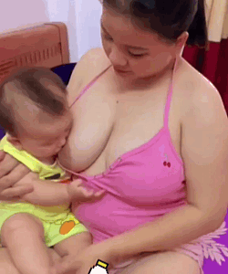 Postpartum woman with her baby