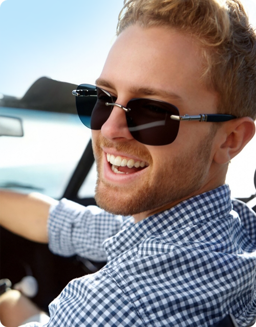 Man wearing frameless sunglasses