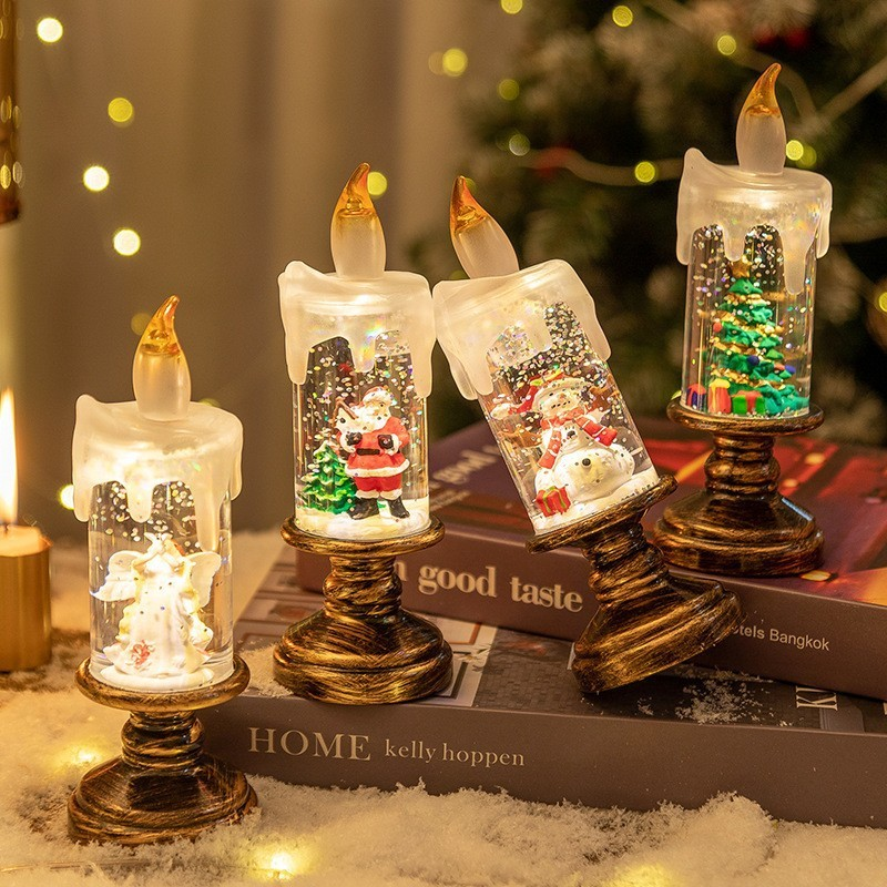 Group of LED candles displayed on books with fairy lights